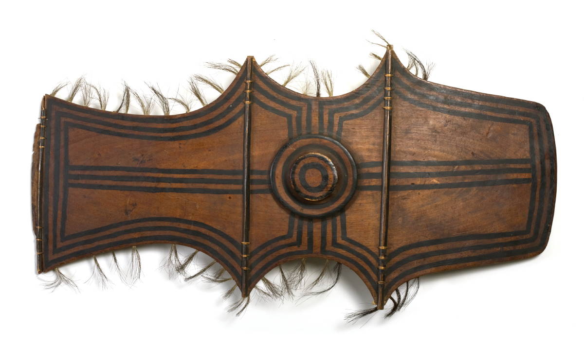 Appraisal: MINDANAO PHILIPPINES BAGOBO TRIBAL SHIELD The curved shield of carved