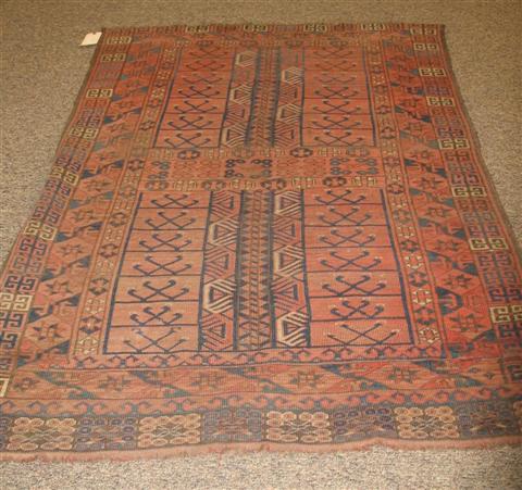 Appraisal: SMALL TURKOMAN CORAL GROUND RUG X Provenance A Virginia Estate