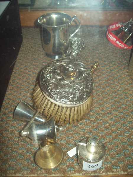 Appraisal: A STERLING SILVER BRUSH SILVER PLATED MUG THREE CANDLE SNUFFERS