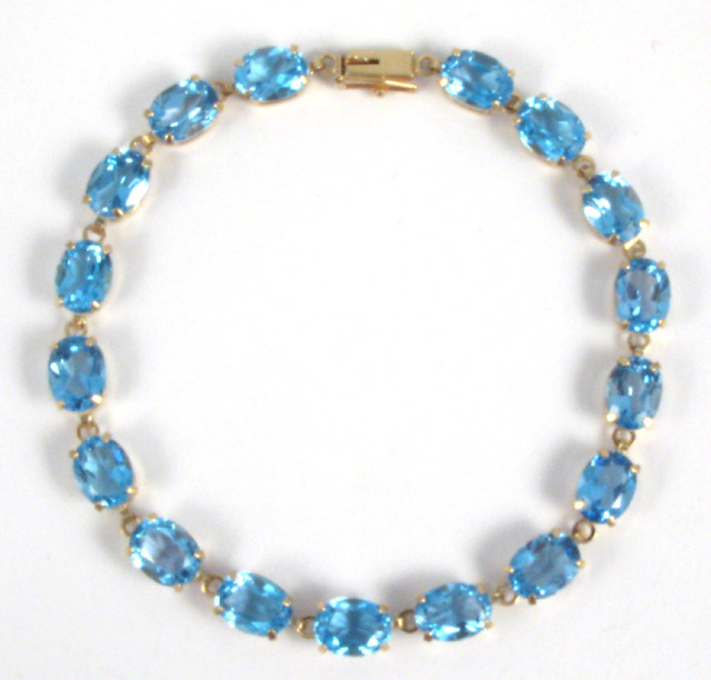 Appraisal: BLUE TOPAZ AND TEN KARAT GOLD BRACELET - in length