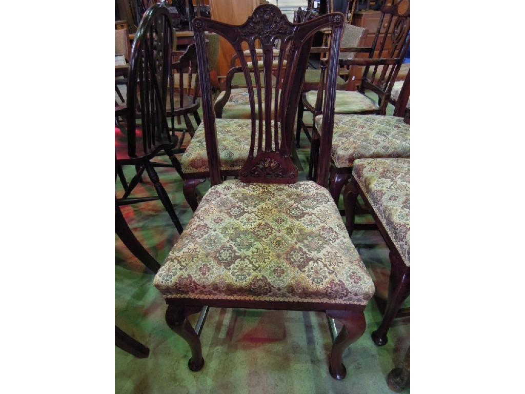 Appraisal: A set of four Edwardian mahogany dining chairs the raised