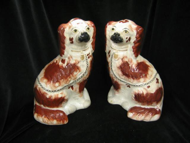 Appraisal: Pair of Staffordshire Spaniel Figurines red decor