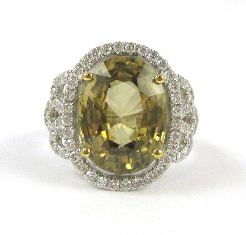 Appraisal: YELLOW ZIRCON AND FOURTEEN KARAT GOLD RING The white and