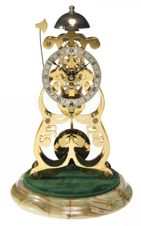 Appraisal: A BRASS SKELETON CLOCK in Victorian style with silvered chapter