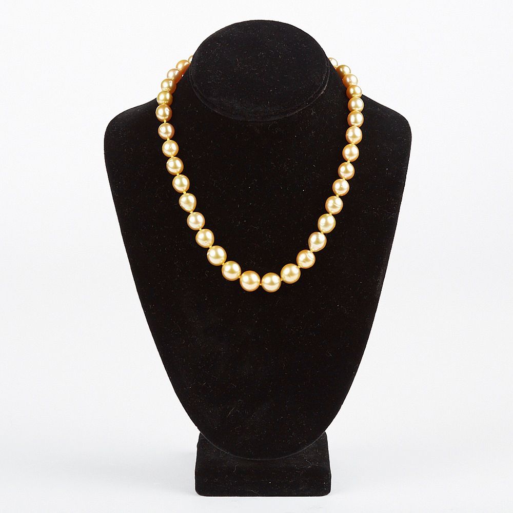 Appraisal: Golden South Sea Pearl Necklace South Sea pearl necklace featuring