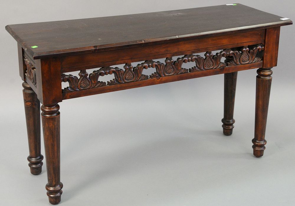 Appraisal: Wood sofa table with pierced foliate carvings to skirt on