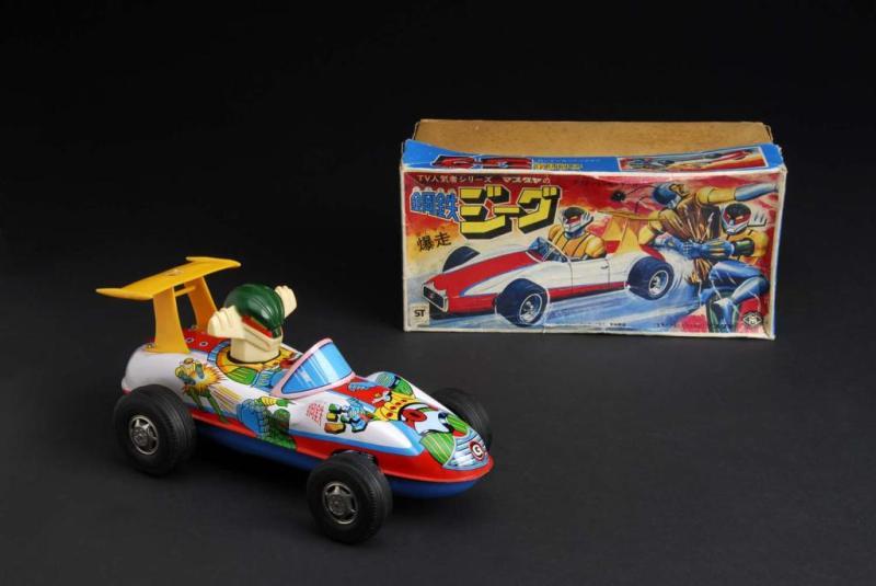 Appraisal: Geag Driving Race Car Toy Description Japanese Made by Masudaya