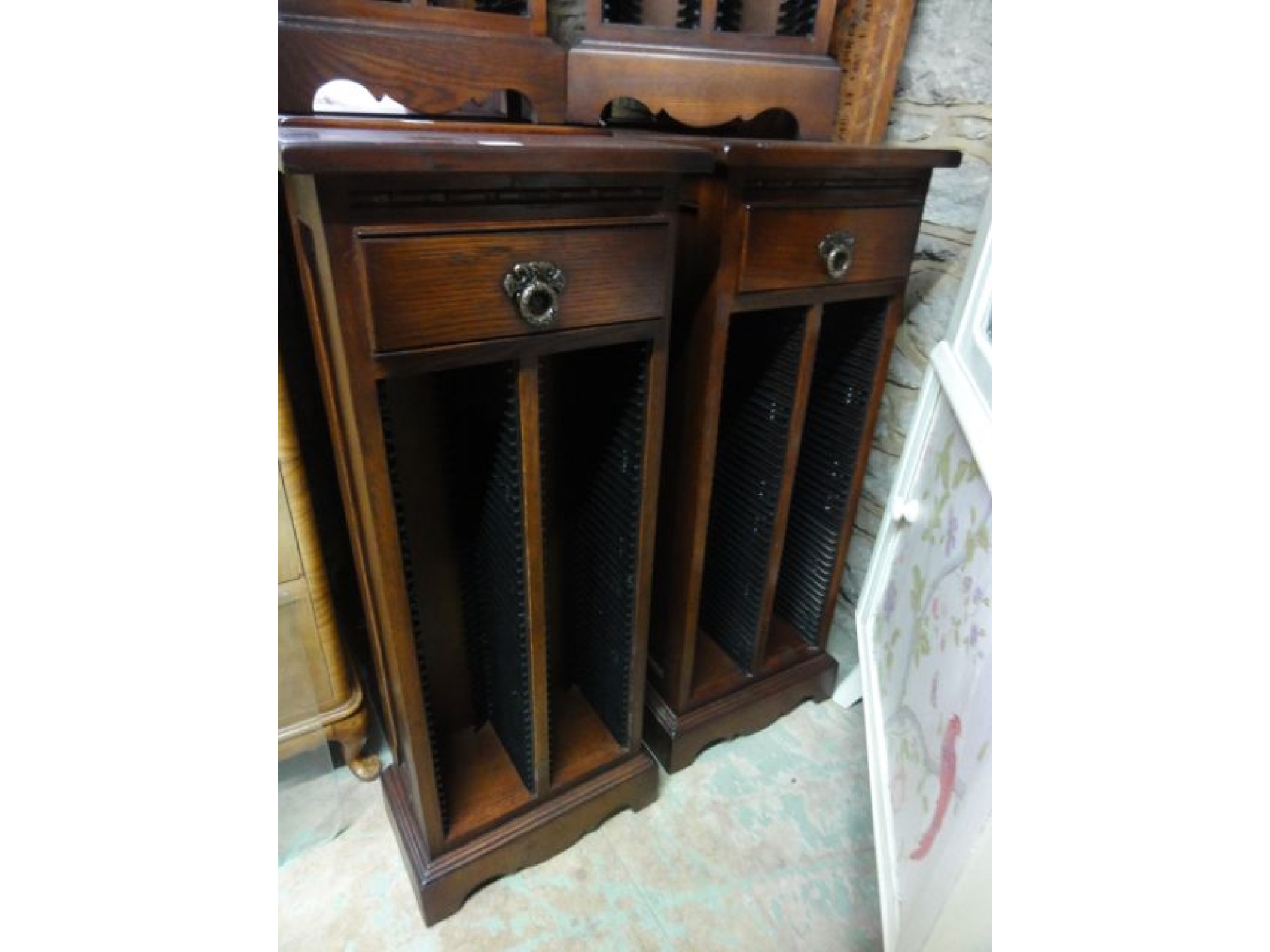 Appraisal: A pair of Old Charm oak freestanding CD storage cabinets