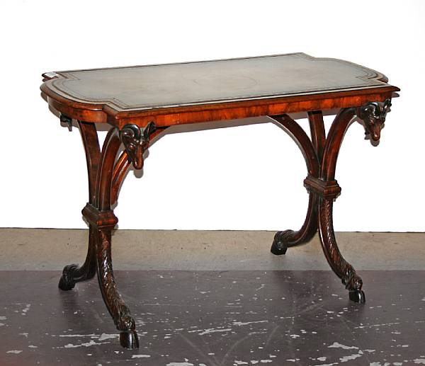 Appraisal: A Neoclassical style leather inset walnut writing table th century