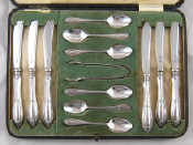 Appraisal: A set of six each silver tea knives and tea