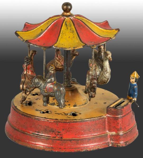 Appraisal: Cast Iron Merry-Go-Round Mechanical Bank Description Manufactured by Kyser and