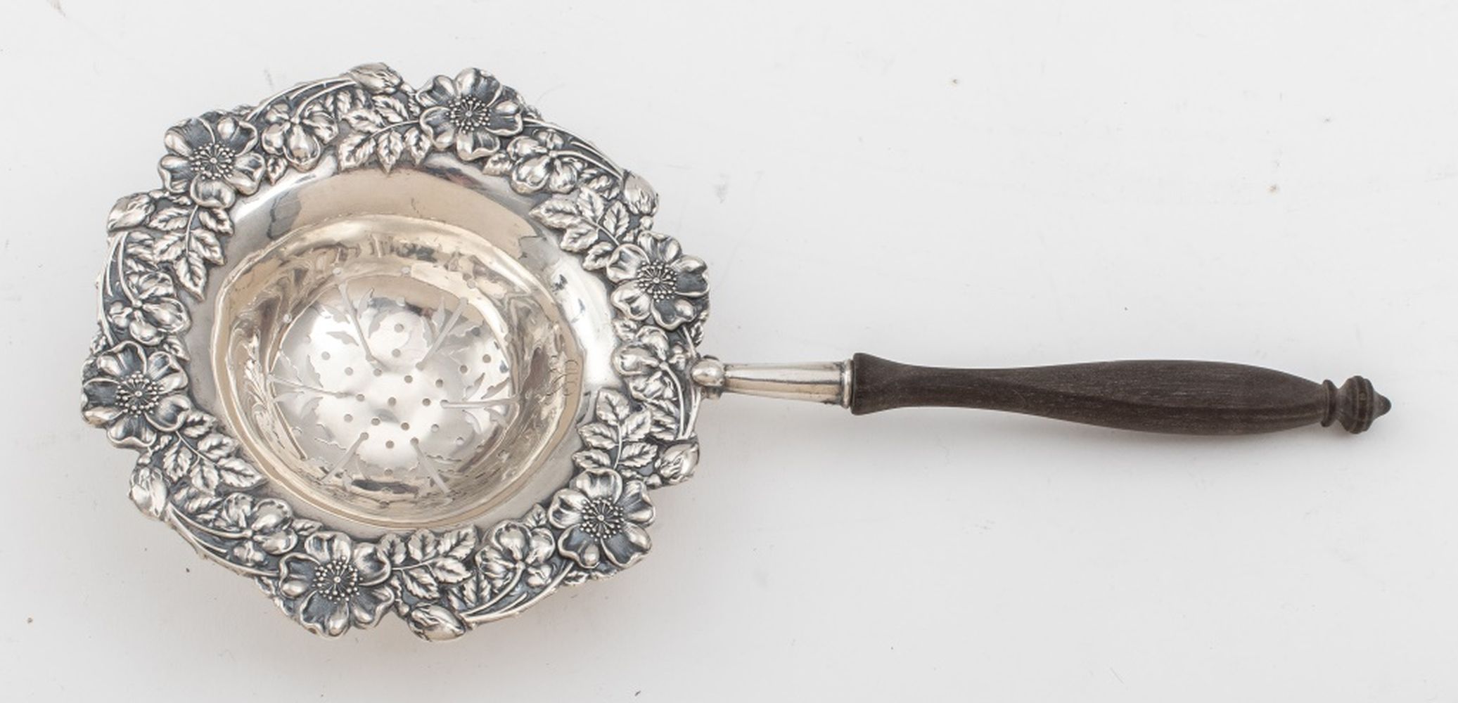 Appraisal: WILCOX EVERTSEN STERLING SILVER TEA STRAINER Wilcox and Evertsen New