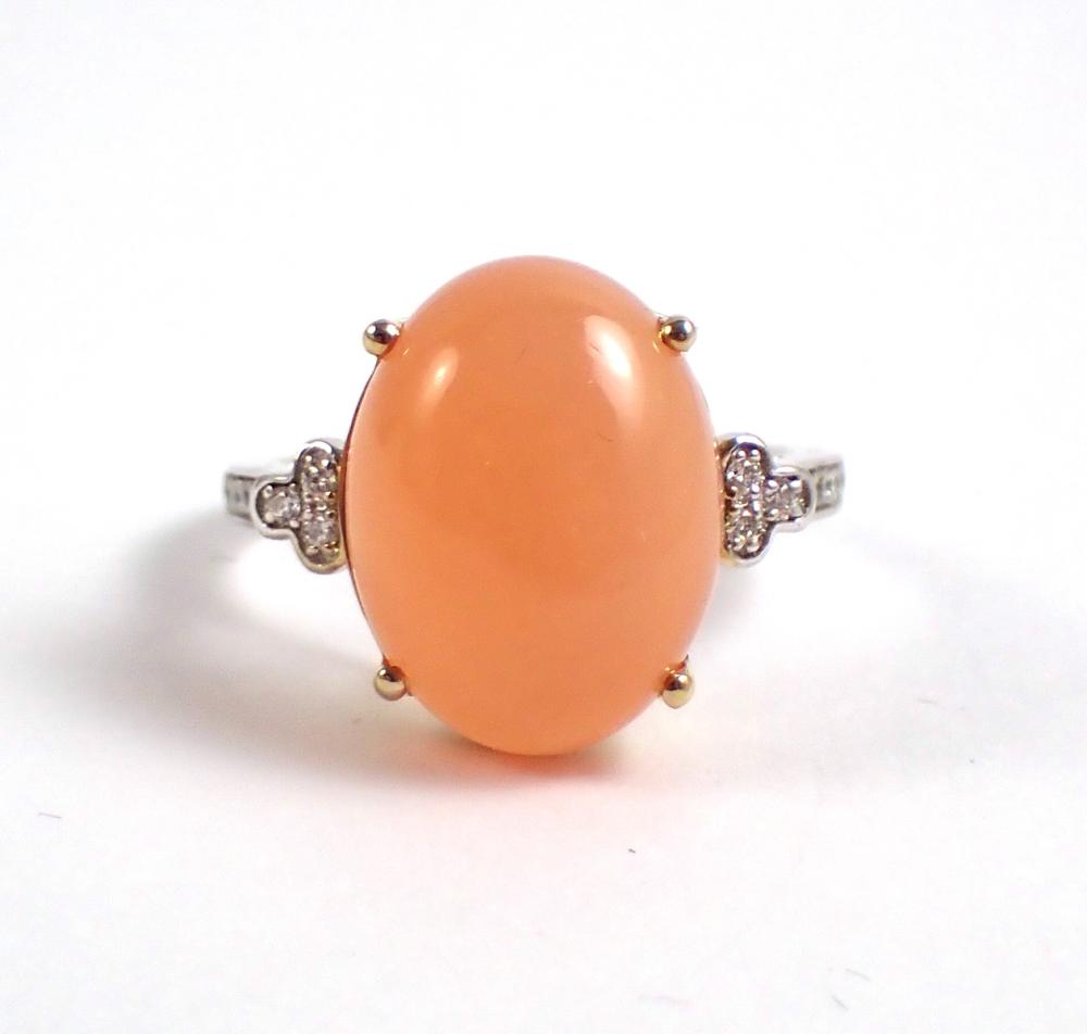 Appraisal: PEACH MOONSTONE DIAMOND AND FOURTEEN KARAT GOLD RING The k