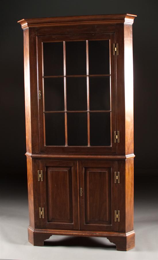 Appraisal: Federal style carved mahogany glass panel corner cupboard Henkel-Harris Winchester