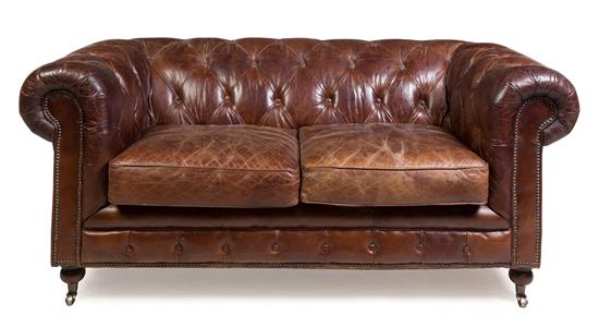 Appraisal: Sale Lot A Leather Upholstered Chesterfield Sofa th century having