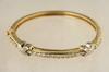 Appraisal: BRACELET - K yellow and white gold hinged bangle bracelet