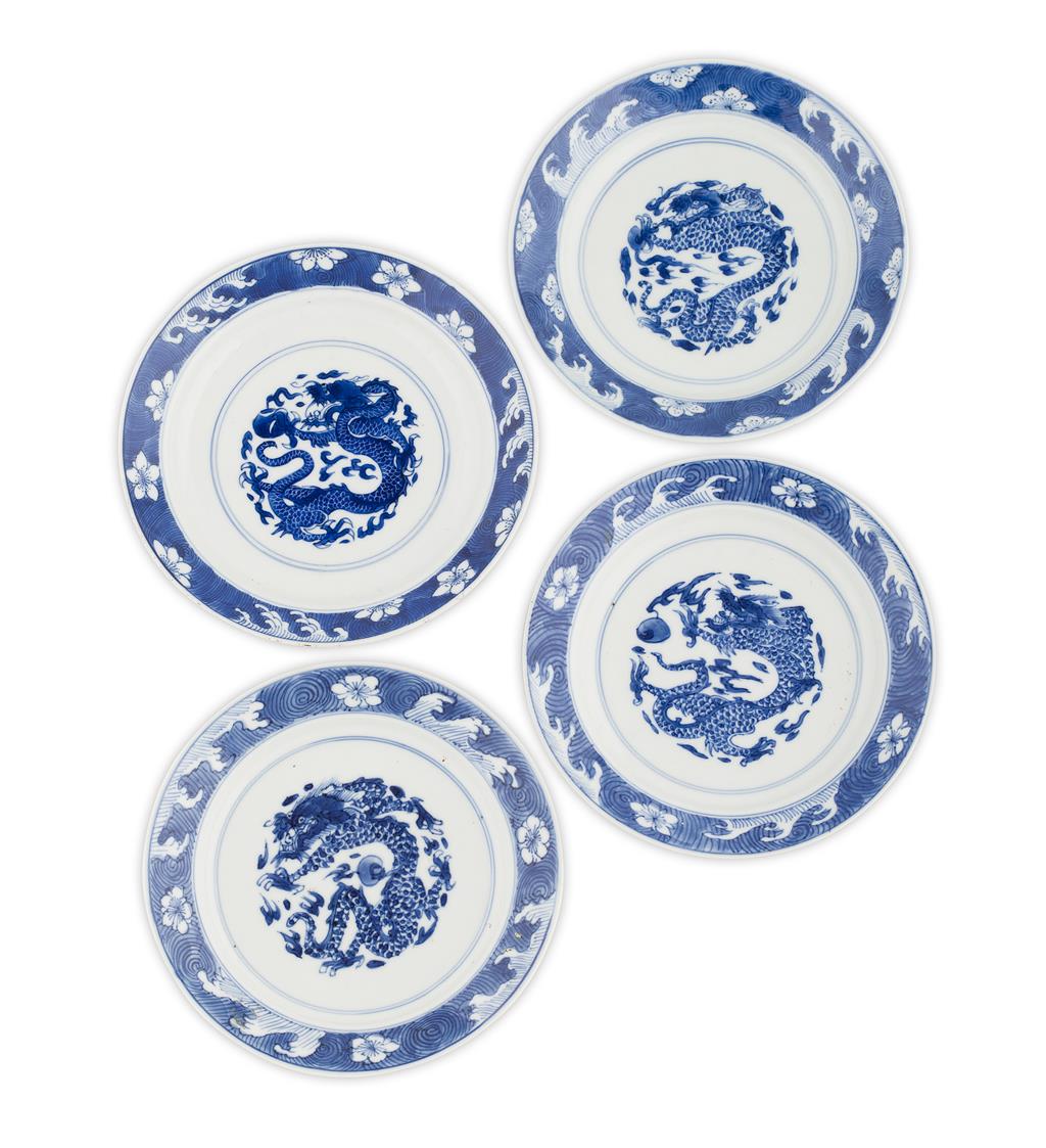 Appraisal: FOUR BLUE AND WHITE 'DRAGON' DISHES KANGXI PERIOD of circular