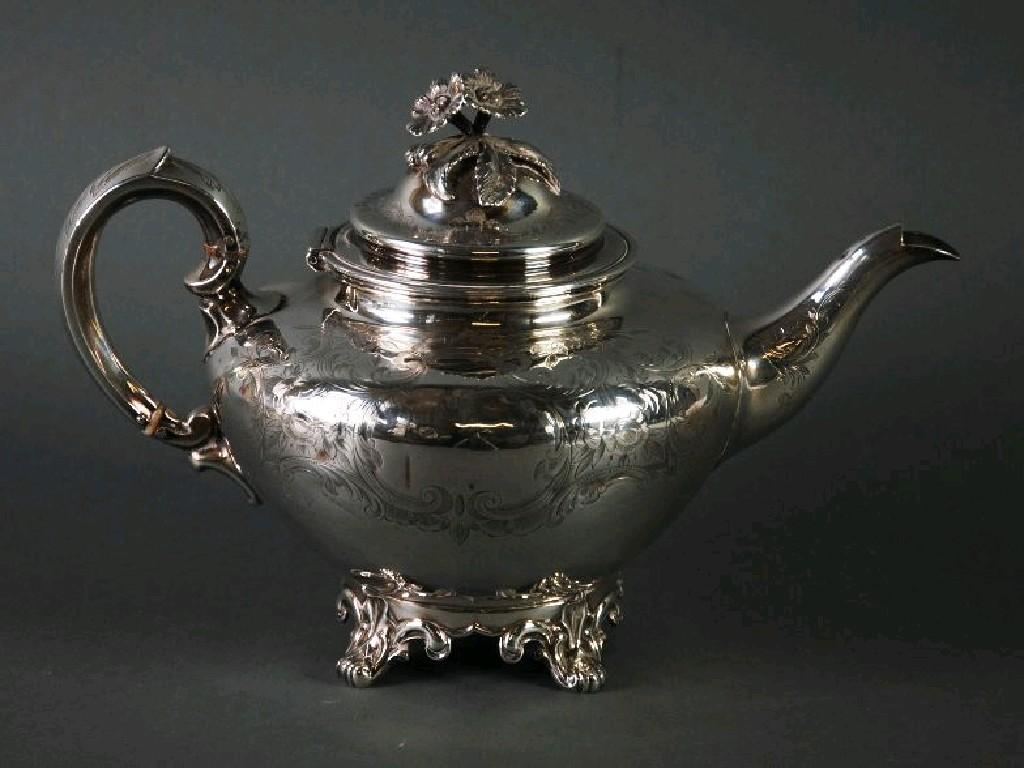 Appraisal: VICTORIAN ENGRAVED SILVER TEAPOT with scroll handle floral cast finial