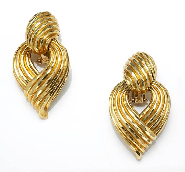 Appraisal: A pair of eighteen karat gold earclips Henry Dunay signed