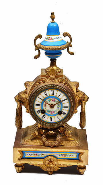 Appraisal: A GILT METAL AND PORCELAIN MOUNTED MANTLE CLOCK the case