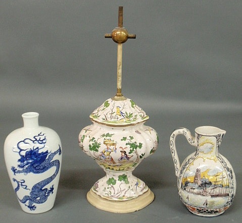 Appraisal: French faience garniture Converted to a lamp h Dutch Delft