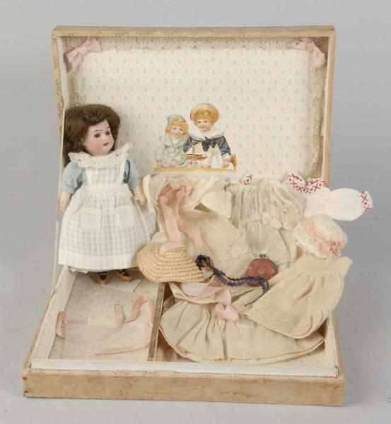 Appraisal: German Bisque Child in Presentation Box Description Bisque socket head