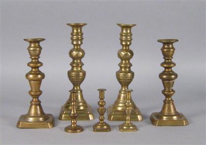 Appraisal: Group of brass candlesticks th century All of baluster form