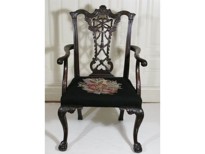 Appraisal: Irish Chippendale Style Open Arm Chair th c mahogany elaborately