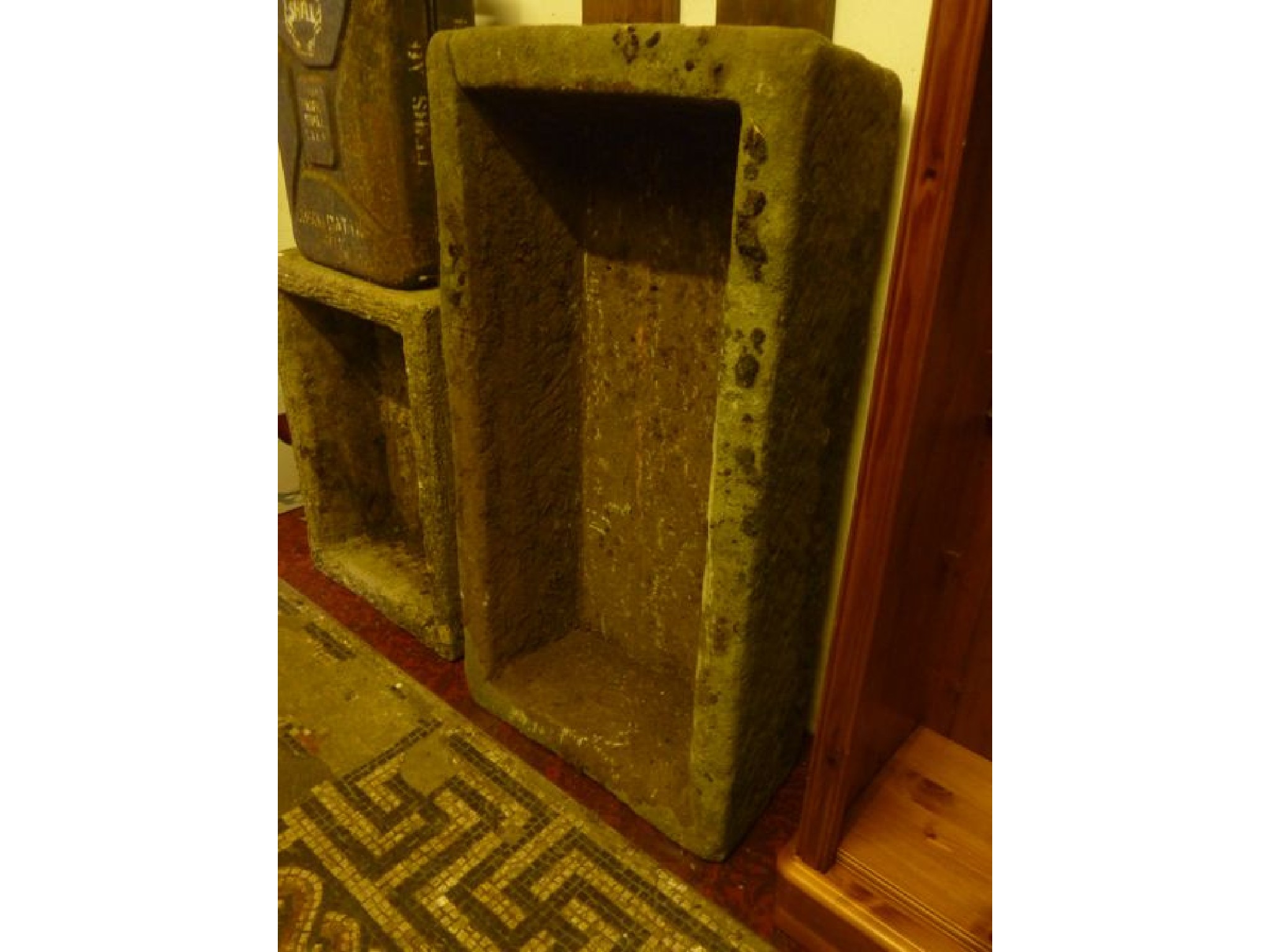 Appraisal: A weathered natural stone trough of rectangular form x cm