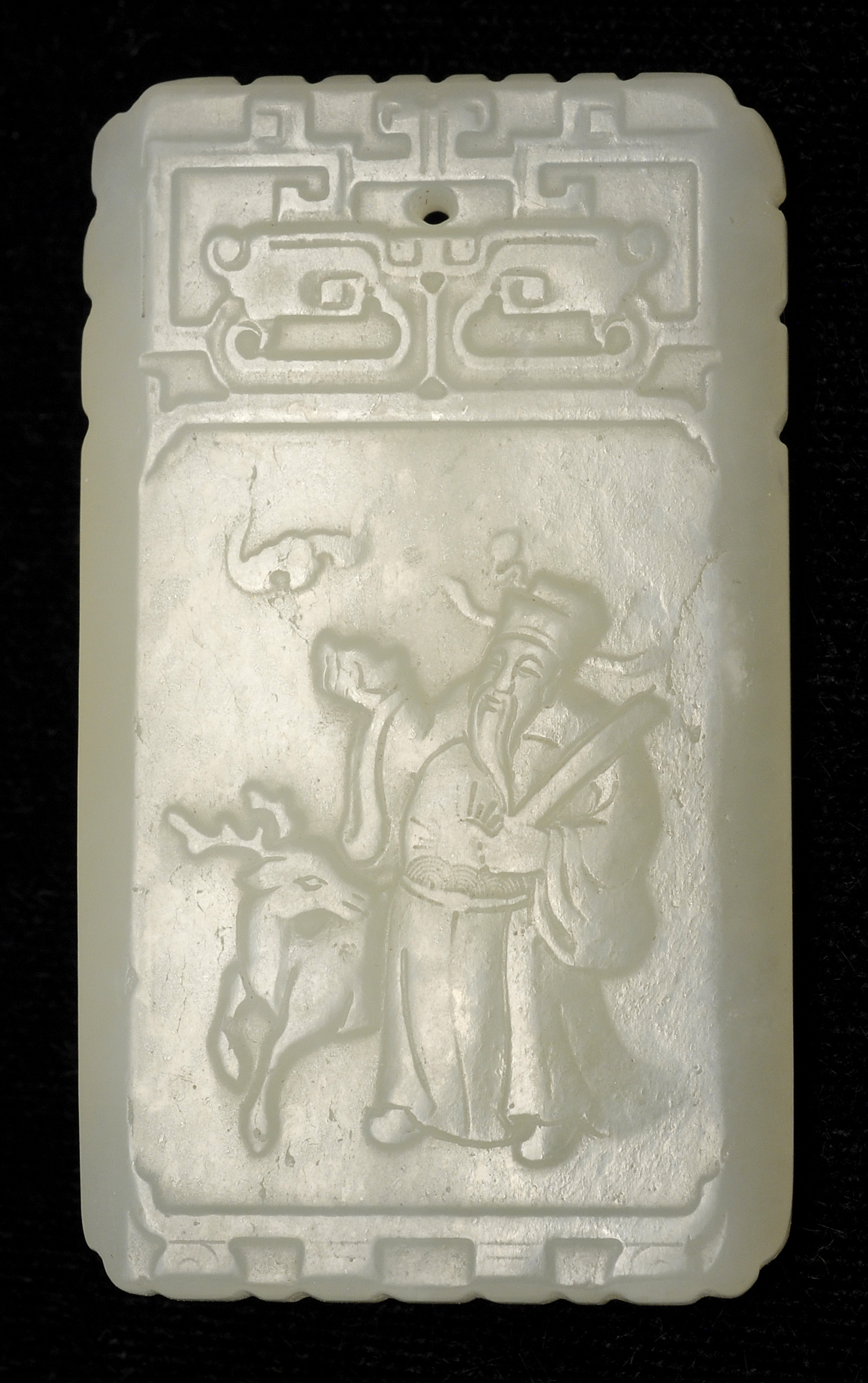 Appraisal: WHITE JADE PENDANT In rectangular form Carved on one face