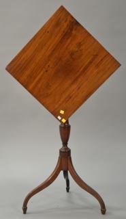 Appraisal: Federal mahogany candlestand having square tip top on urn carved