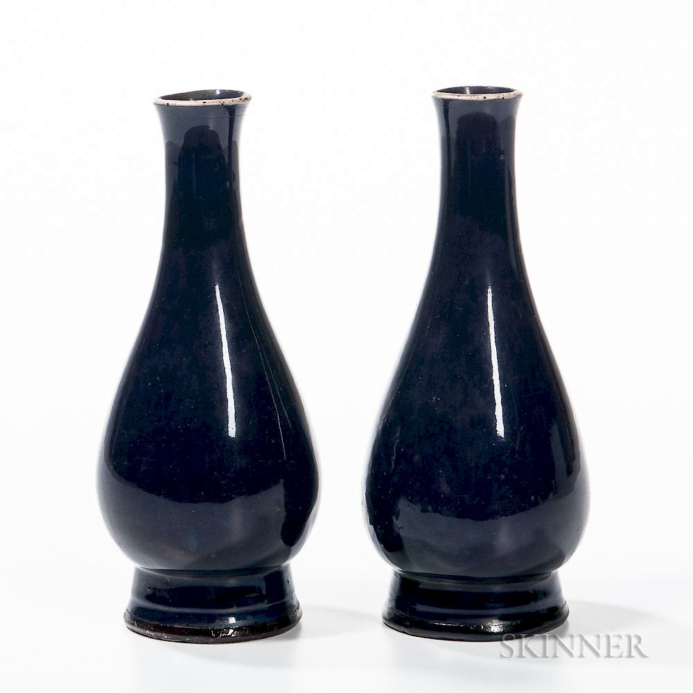 Appraisal: Pair of Aubergine Vases Pair of Aubergine Vases China pear-shaped