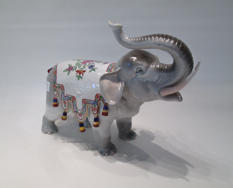 Appraisal: DRESDEN PORCELAIN ELEPHANT in a standing position with upward trunk