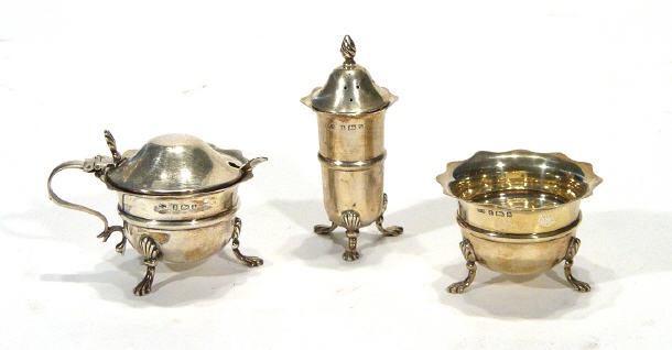 Appraisal: Three piece silver cruet set with shell design splayed feet