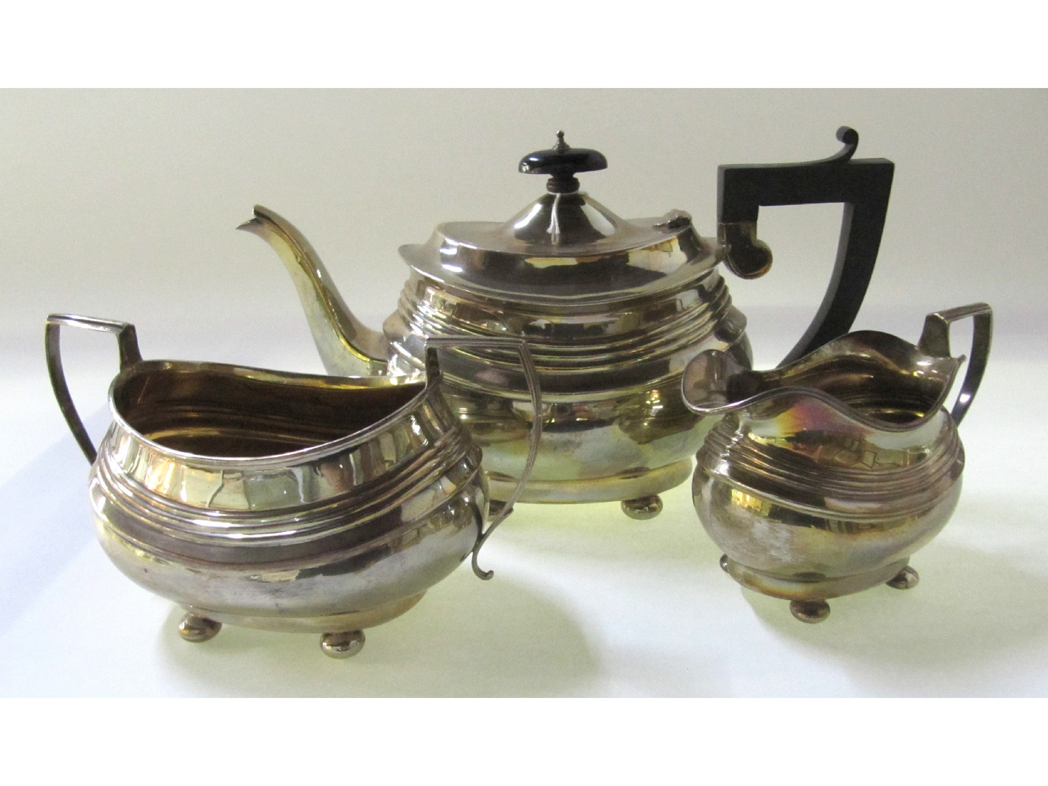 Appraisal: A three piece silver tea service Birmingham