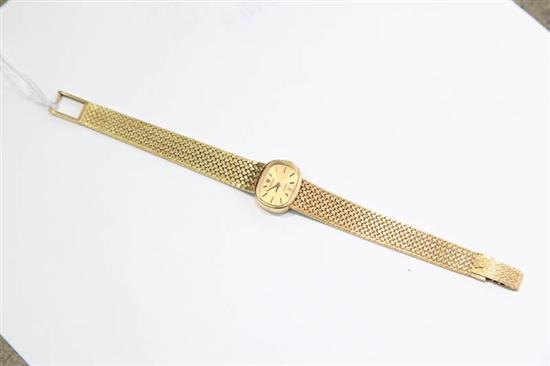 Appraisal: LADY'S WATCH A marked ''Rolex K Orchid'' yellow gold wrist