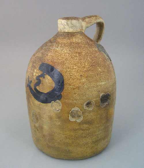 Appraisal: Rare man-in-the-moon stoneware jug impressed Cowden Harrisburg h