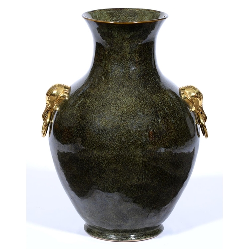 Appraisal: A Continental mottled green glazed earthenware vase th st c