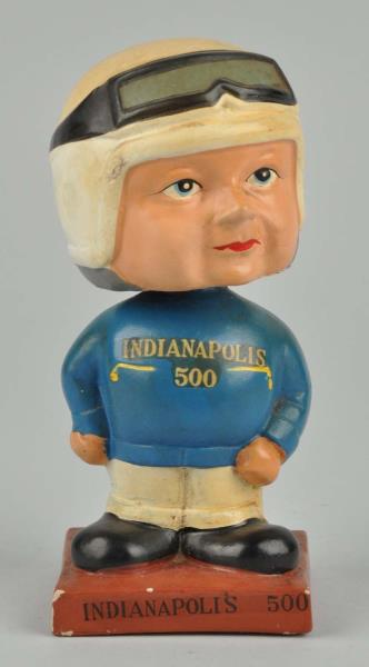 Appraisal: Indianapolis Race Car Driver Bobble Head Marked on bottom of