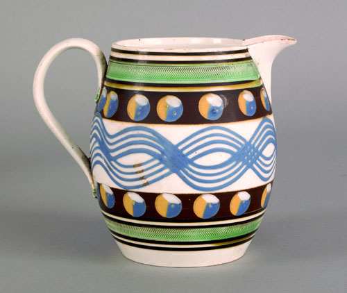 Appraisal: Mocha pitcher th c with cat's-eye and blue navy line