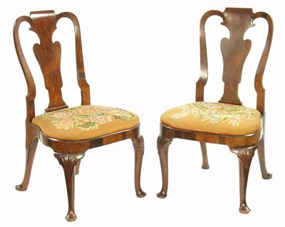 Appraisal: A pair of George I walnut side chairs the burr