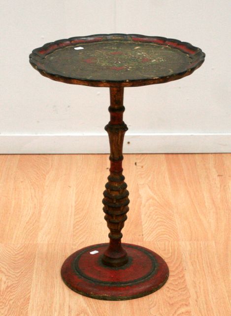 Appraisal: A th Century carved and paint decorated circular wine table