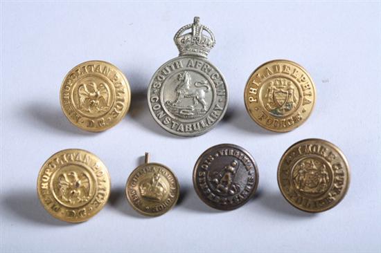 Appraisal: SEVEN VINTAGE METROPOLITAN POLICE UNIFORM BUTTONS For various districts including