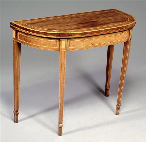 Appraisal: A rosewood and satin birch crossbanded card table in George