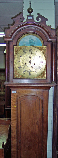 Appraisal: An eight-day longcase clock the arched brass face with inscription