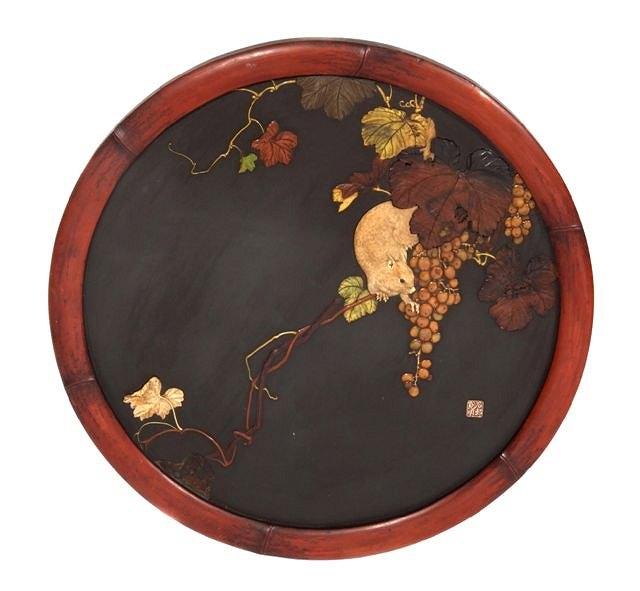 Appraisal: A JAPANESE CIRCULAR WOODEN PLAQUE with ivory and bone decoration