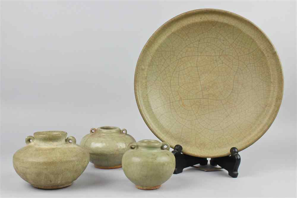 Appraisal: A CHINESE CELADON DISH WITH THREE CELADON JARLETS YUAN MING