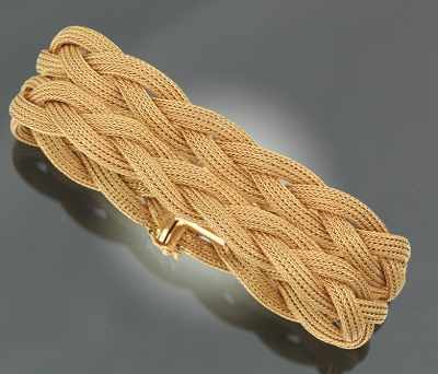 Appraisal: A Ladies' Braid Design Bracelet k yellow gold bracelet designed