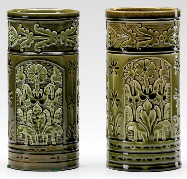 Appraisal: CHELSEA KERAMIC ART WORKS Two cylindrical vases carved embossed and