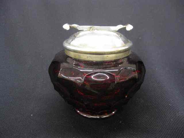 Appraisal: Ruby Glass Covered Sugar Bowl honeycombdesign with silverplate top unusual